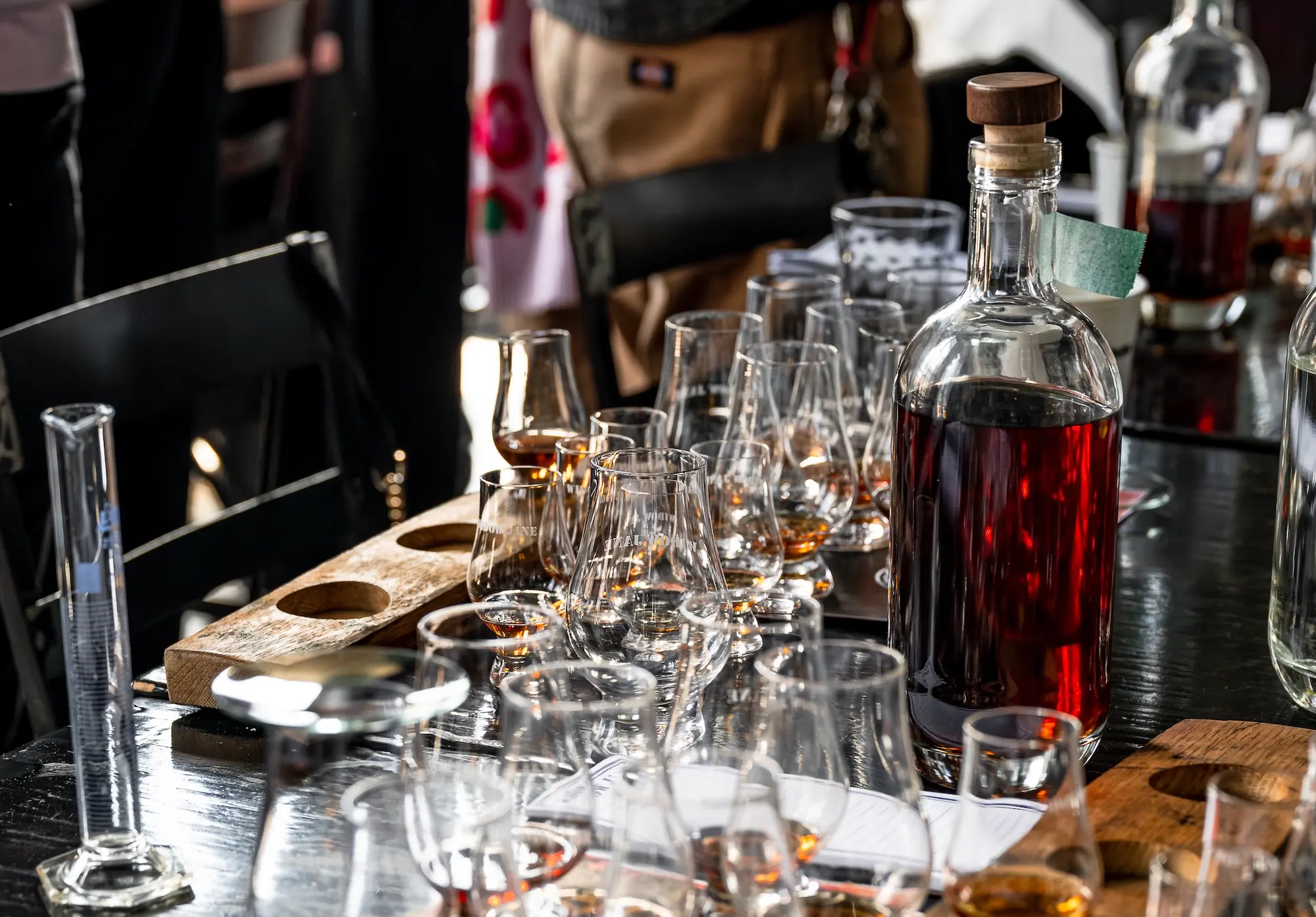 Glencairns of Borough Blend spread across a large table next to the bottle